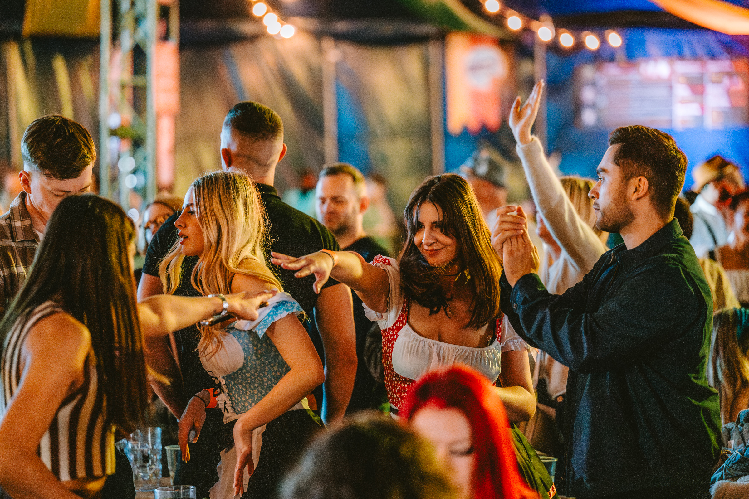 Guests dancing and enjoying the festival atmosphere