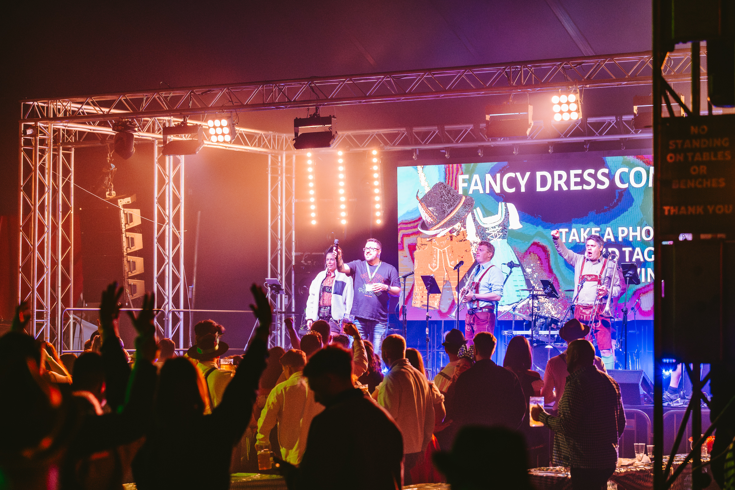 Live stage and crowd at an Oktoberfest event
